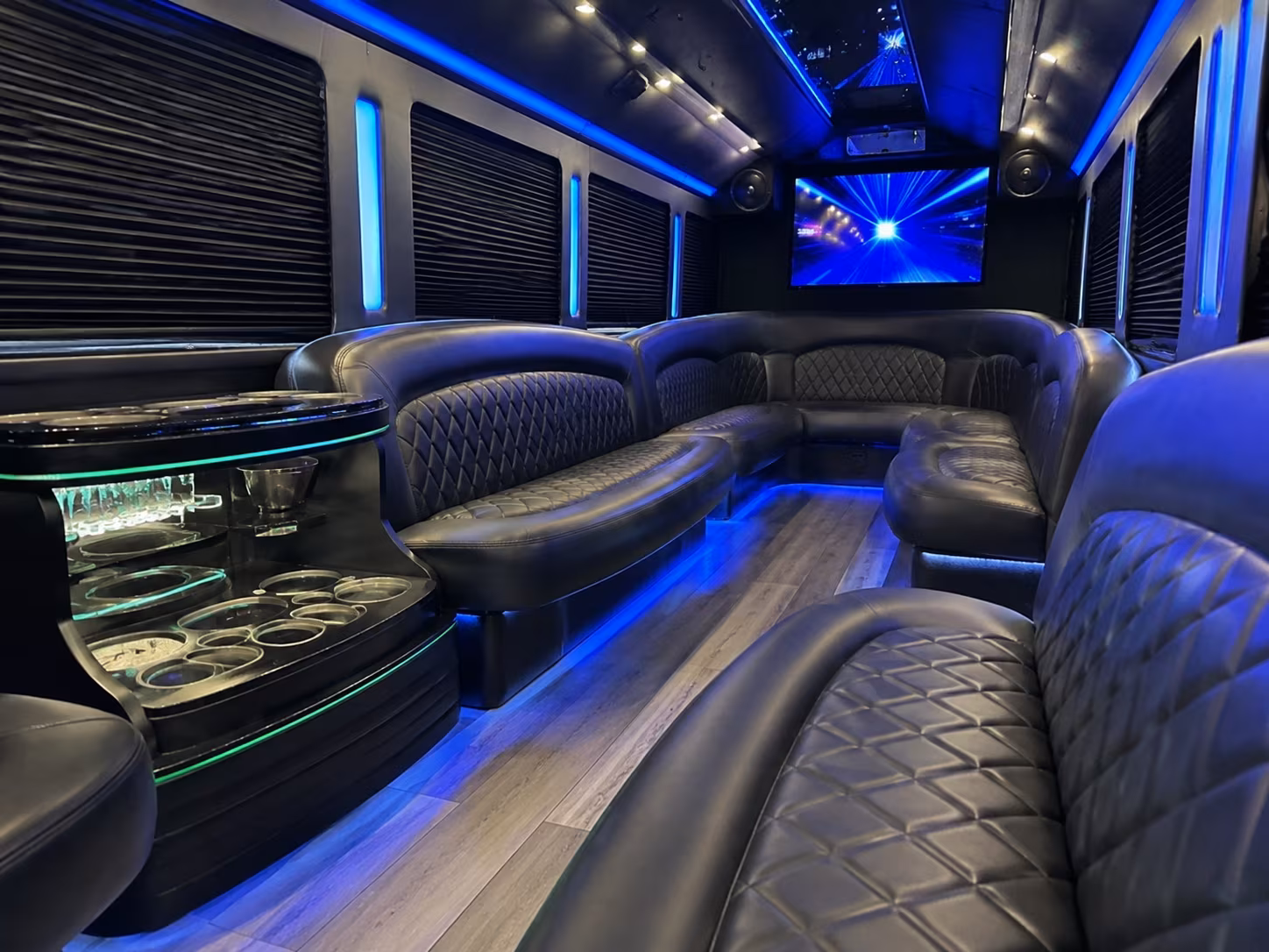 Group beside a Mercedes Sprinter limo in Atlanta