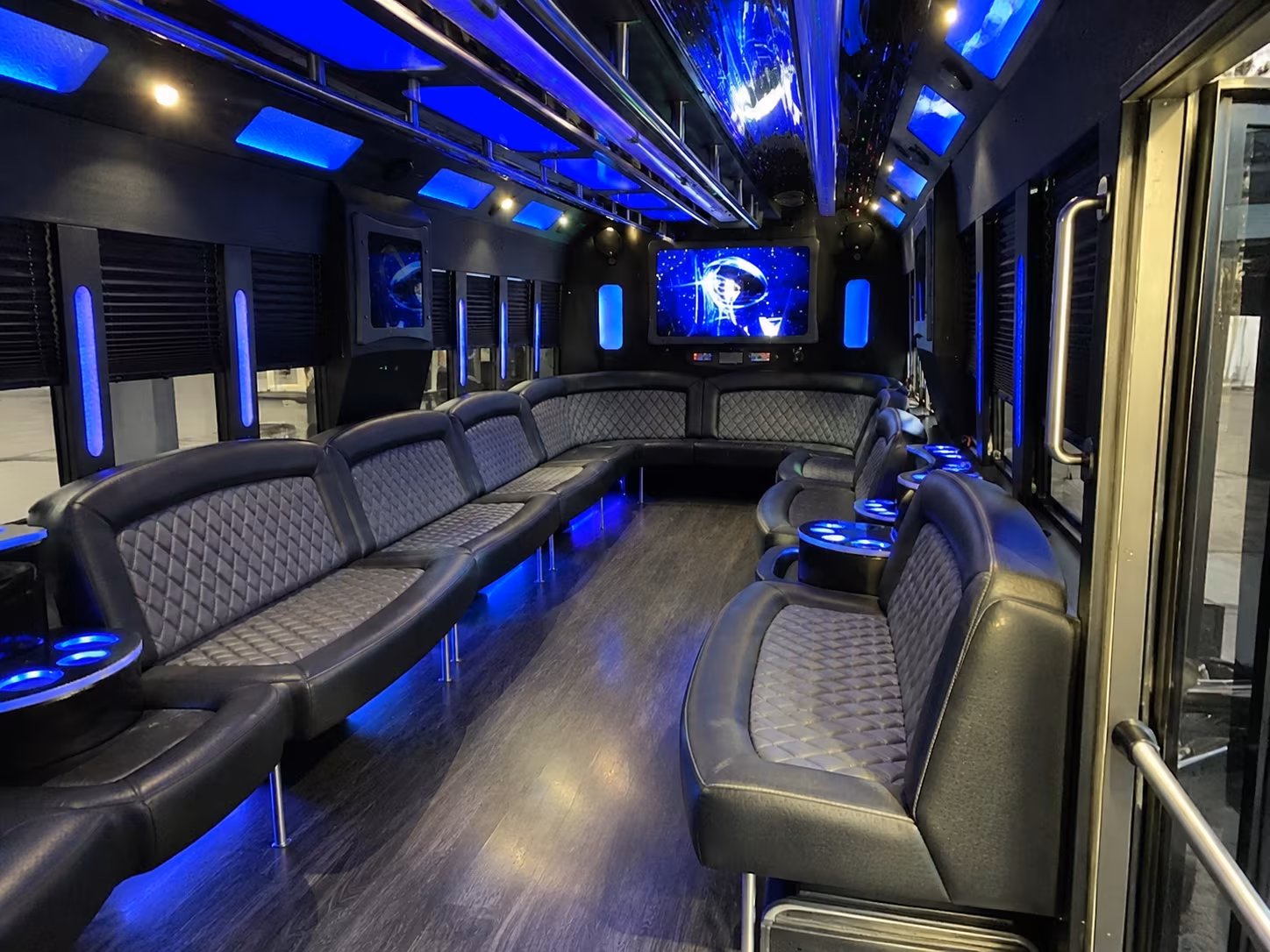 Wedding guests seated inside a party bus serving Atlanta