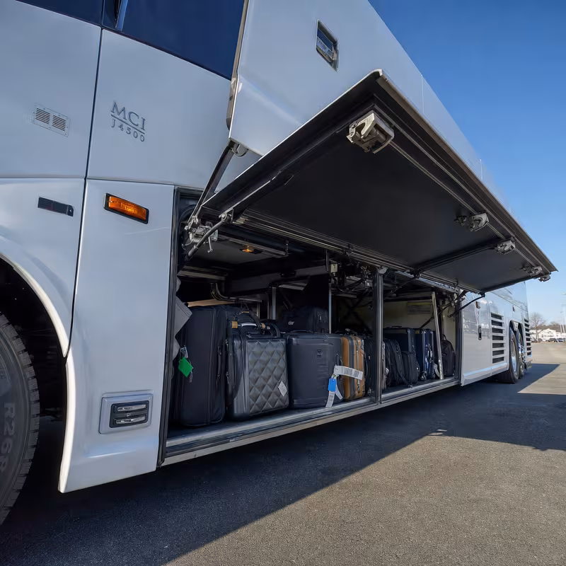 Party bus interior with wraparound leather seating and LED lighting in Atlanta