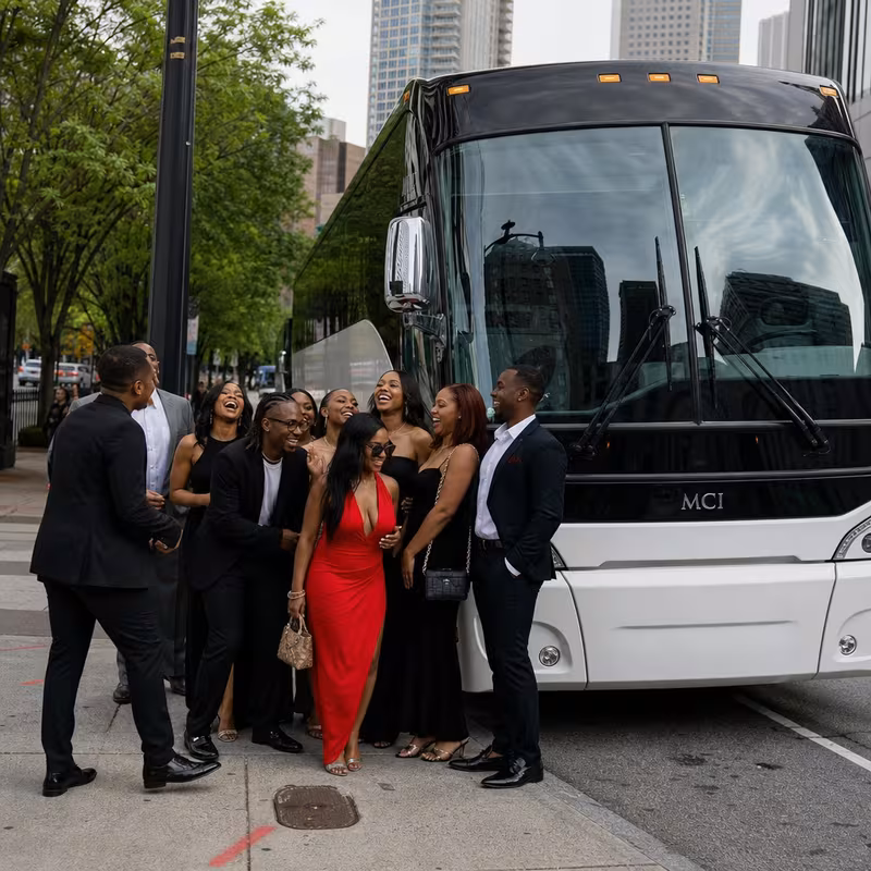 Passengers loading luggage while boarding an Atlanta group shuttle