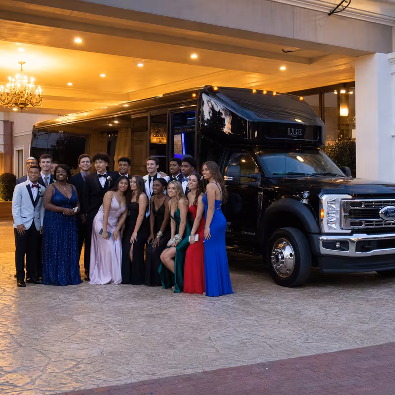 Party bus interior with wraparound leather seating and LED lighting in Atlanta