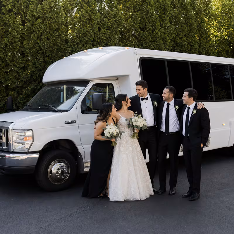 Passengers loading luggage while boarding an Atlanta group shuttle